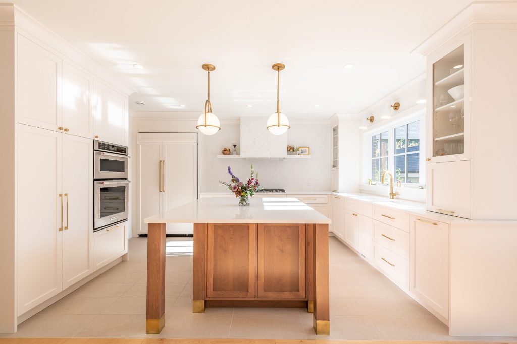 White kitchen with bronze cabinets