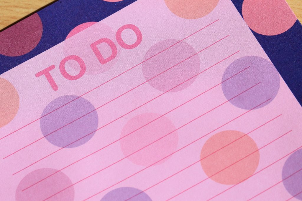 a brightly colored polka dot covered piece of paper with "to do" written at the top